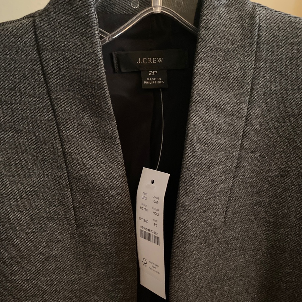 Grey twill. New, tags still attached.